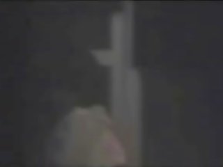 Скрит камера извън прозорец японки госпожица мастурбира