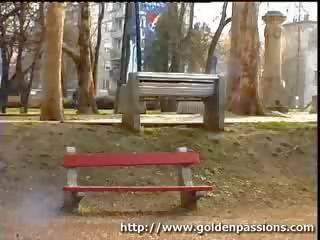 Ripened redhead peeing on the streets with people around