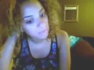 Curly Webcam femme fatale Gets Naked