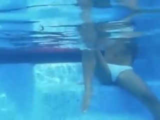Underwater pose of charming boobs