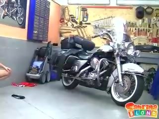 Oversexed blonde teen with small tits stripping by the motor bike