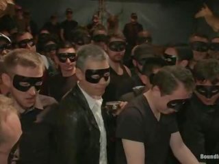 Captured Stud Is being abused In A Bar Full Of hot to trot Masked Men