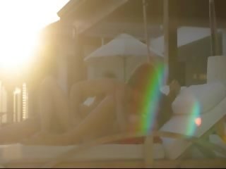 Mutual beauties orgasme on the sunbed