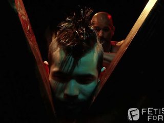 Draven cries out as tony flogs him on a st andrew s cross