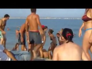Teen fancy woman Losing Her Bikini At The Beach