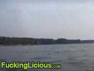 Amateur blonde masturbating on boat