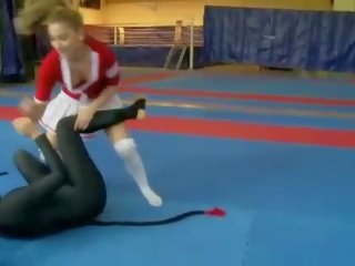Two voluptuous beauties fighting