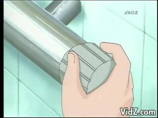 Bunch of buddies slide a dildo on a damsel