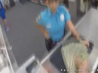 Real cop moonlights as ho for pawn shop