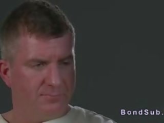 Slave In Straitjacket Gets Handjob