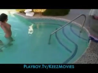 Bikini clad brunette seduces her blonde GF in the pool