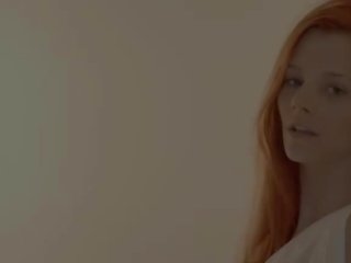 Unbeliveably busty redhead undressing