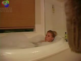 Sedusive blond teenager kejiret playing with herself in the bath