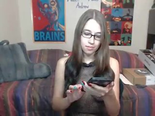 Enchanting teen strips into fishnet outfit