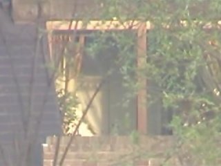 Topless teenager in the neighbour's window