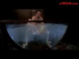 Blonde damsel With Tied Legs And Arms Getting Her Mouth And Pussy Fucked In The Aquarium By professor In The Dungeon