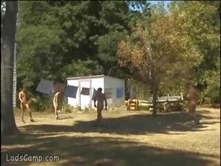 Steamy outdoor foursome gay orgy in the striplings Camp