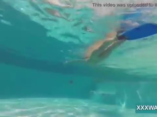 Super brunette whore Candy swims underwater