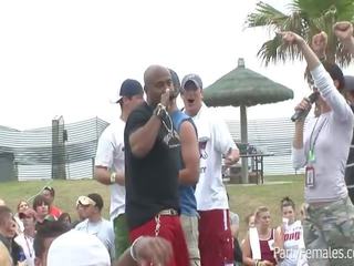 Hotties entertain the crowd by flashing susu