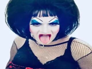 Sissy escort in heavy makeup shows off for cam