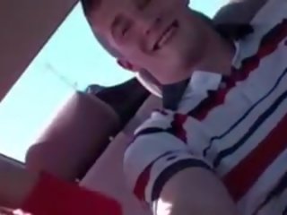 Two Brunette Coeds Sucking phallus In Car