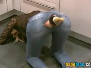 Pouring from a botol in her loose bokong