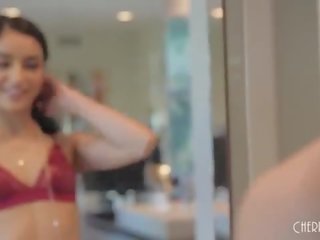 Young brunet divinity strips out of her içki geýim and masturbates